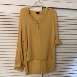 Yellow long sleeve high low top